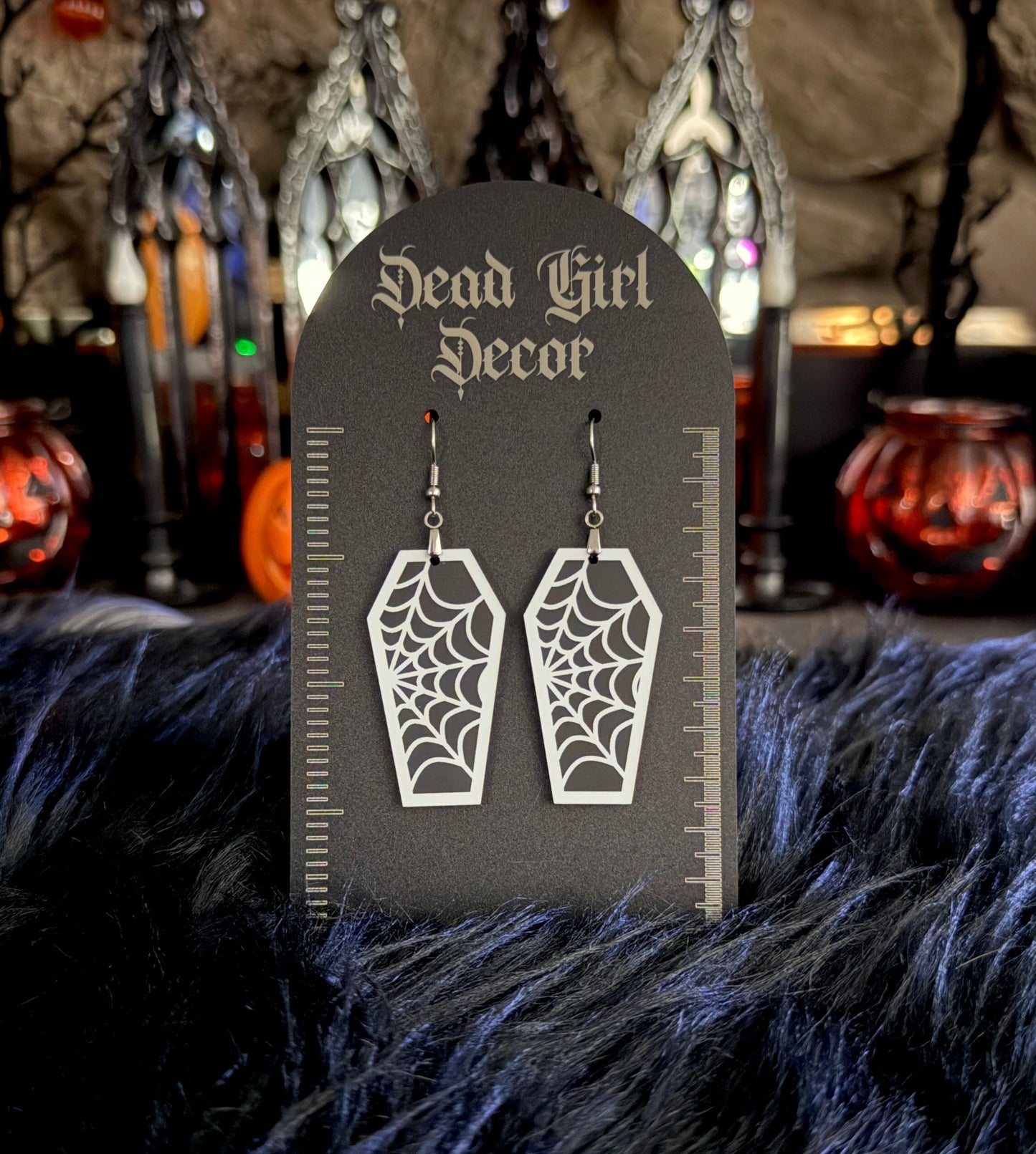 Web coffin earrings